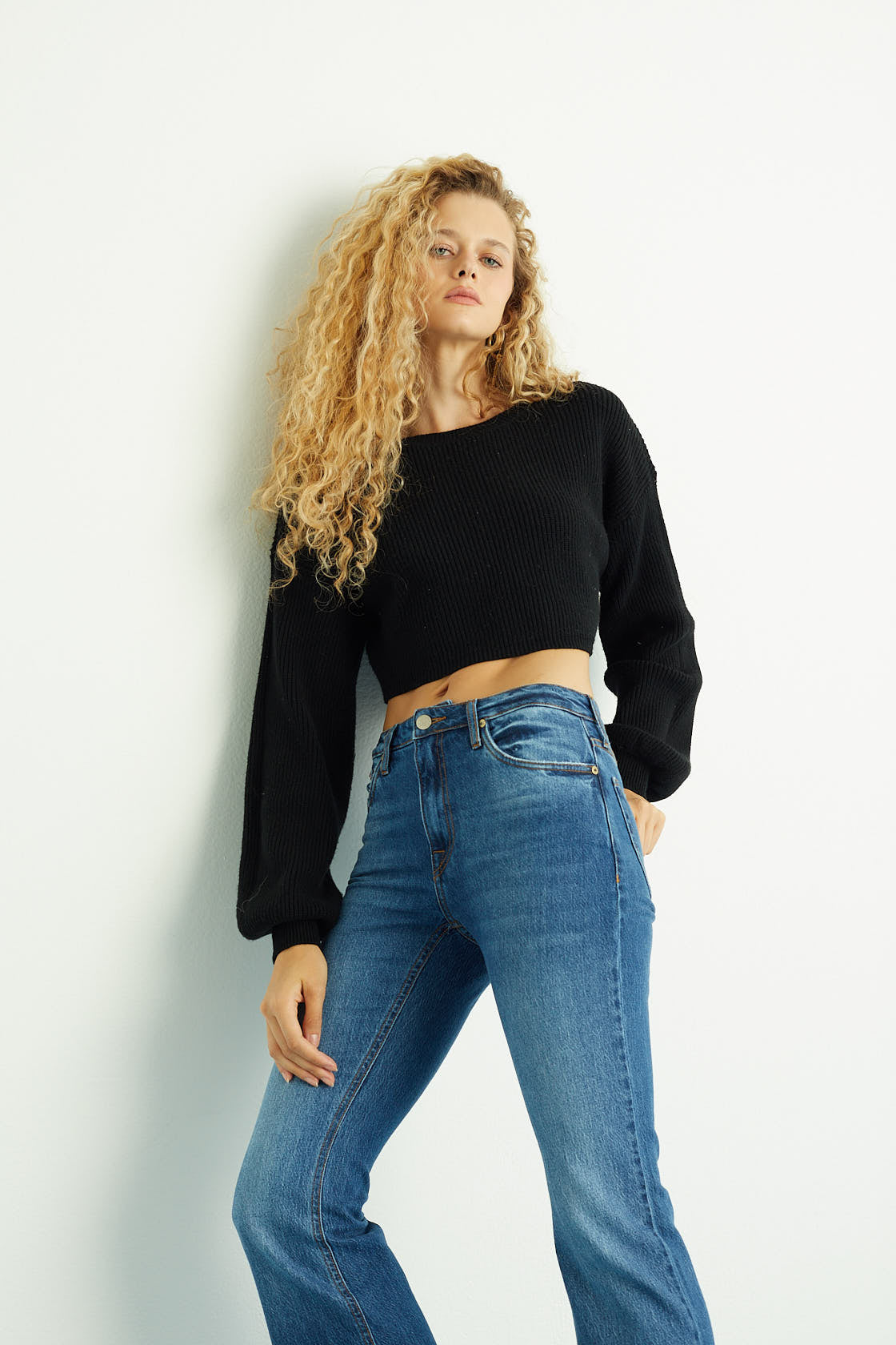 Calça Bootcut Fenda Jeans Médio